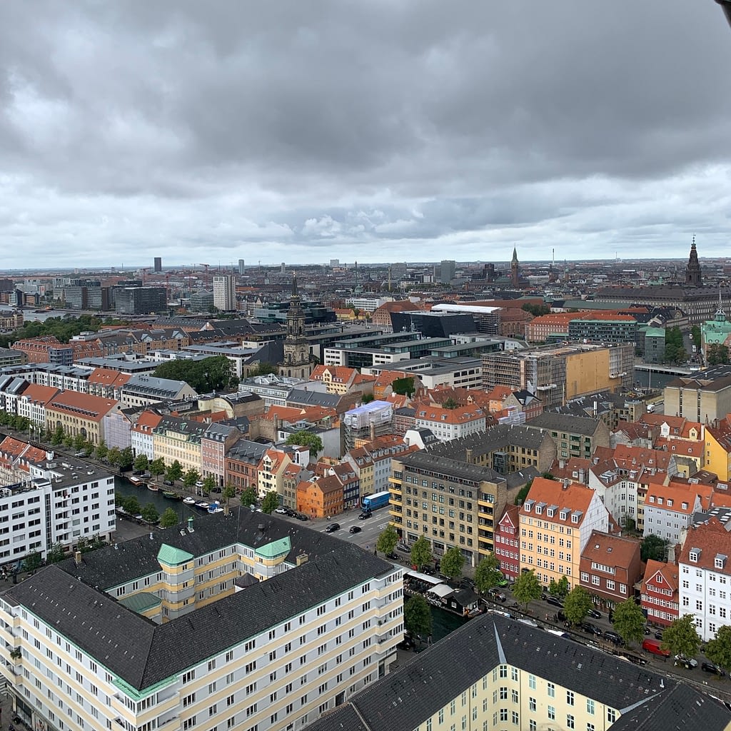 Colorful buildings seen from above with cloudy sky