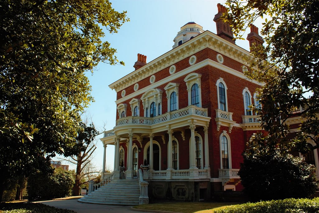 Red brick building with white moulding